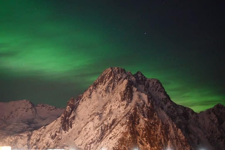 Watching Aurora With Kids From The Warmth of Cabin Hotel